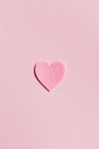 Download pink background with hearts HD